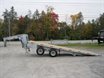 Sliding axle trailers