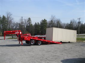 Sliding axle container trailer